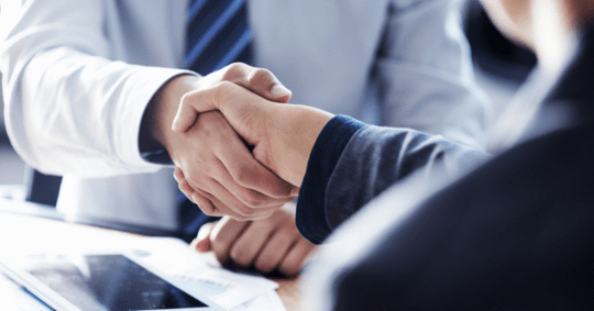 Two people shaking hands