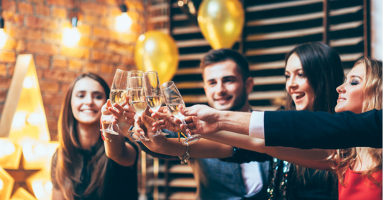 friends tapping wine glasses