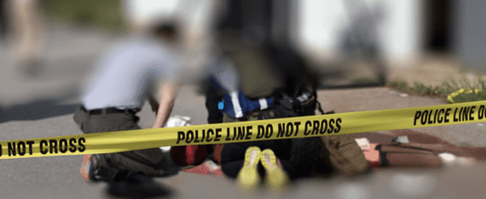 Police line do not cross tape at a crime scene