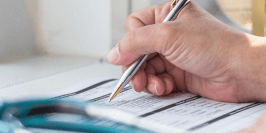 Individual signing a document